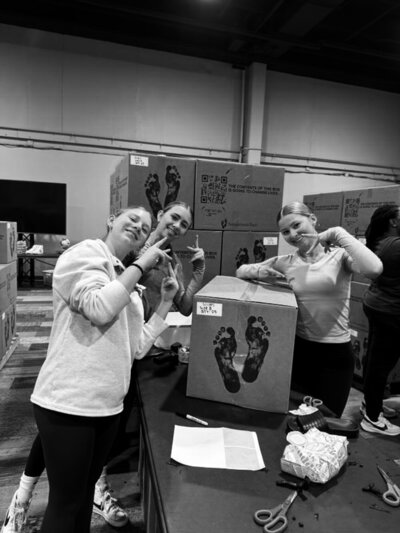 Samaritans Feet student volunteers supporting shoe donations