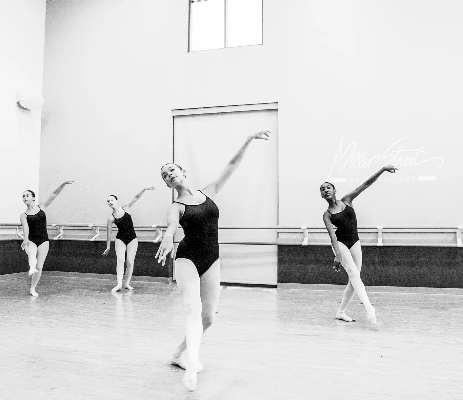 Ballet Company dancers rehearsing in white costumes